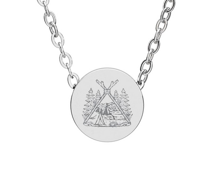 Silver necklace with a round pendant on a white background