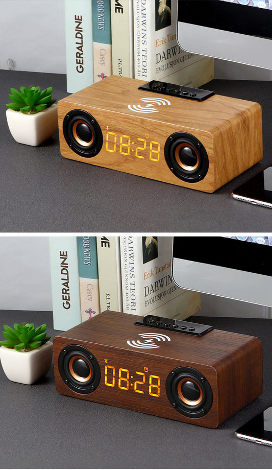 Wooden clock radio with digital display on a desk